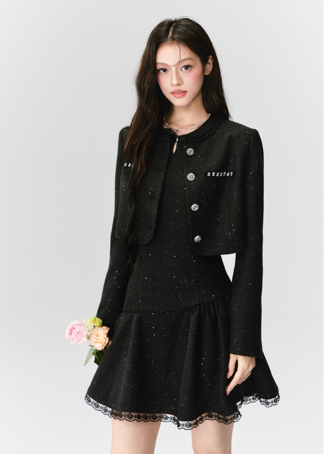 A constellation of refinement — the Noir Étoile Ensemble merges classic Parisian tailoring with Fragileheart’s pastel-noir sensuality. The cropped glitter tweed jacket and sculpted mini dress shimmer with quiet confidence, revealing both softness and strength. Perfect for evenings when sophistication meets modern rebellion.