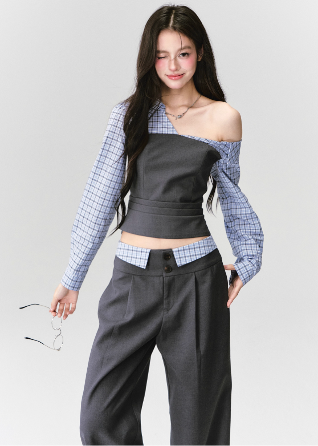 Where intellect meets allure — the Philosophical Trajectory Set redefines structured femininity through sculpted tailoring and poetic imbalance. The asymmetric neckline bares one shoulder in quiet defiance, merging plaid intellect with charcoal precision. Designed for the woman whose grace carries both thought and edge.