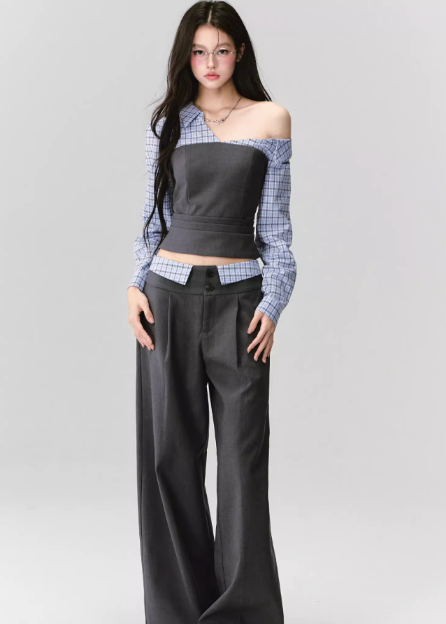 Where intellect meets allure — the Philosophical Trajectory Set redefines structured femininity through sculpted tailoring and poetic imbalance. The asymmetric neckline bares one shoulder in quiet defiance, merging plaid intellect with charcoal precision. Designed for the woman whose grace carries both thought and edge.