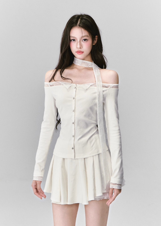 Ethereal and composed, the White Moonlight Sonata Set embodies Fragileheart’s quiet-luxury vision. The off-shoulder lace top and embroidered skirt whisper of moonlit evenings and polished confidence. Soft satin sheen meets delicate tailoring, creating a timeless silhouette that speaks of grace without needing attention.