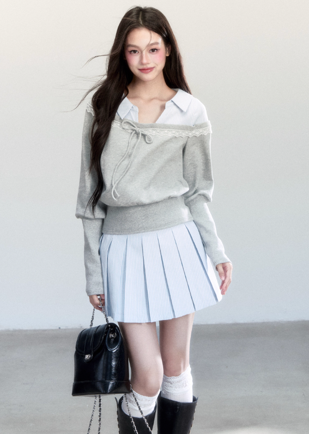 Fragileheart layered set, blue striped pleated skirt, luxury Korean fashion, preppy K-fashion outfit, faux two-piece knit top, quiet luxury womenswear, pastel noir aesthetic, elegant school style, 2025 autumn collection, modern feminine outfit, soft grey sweatshirt set, chic Korean look, academic romantic fashion, delicate layered design
