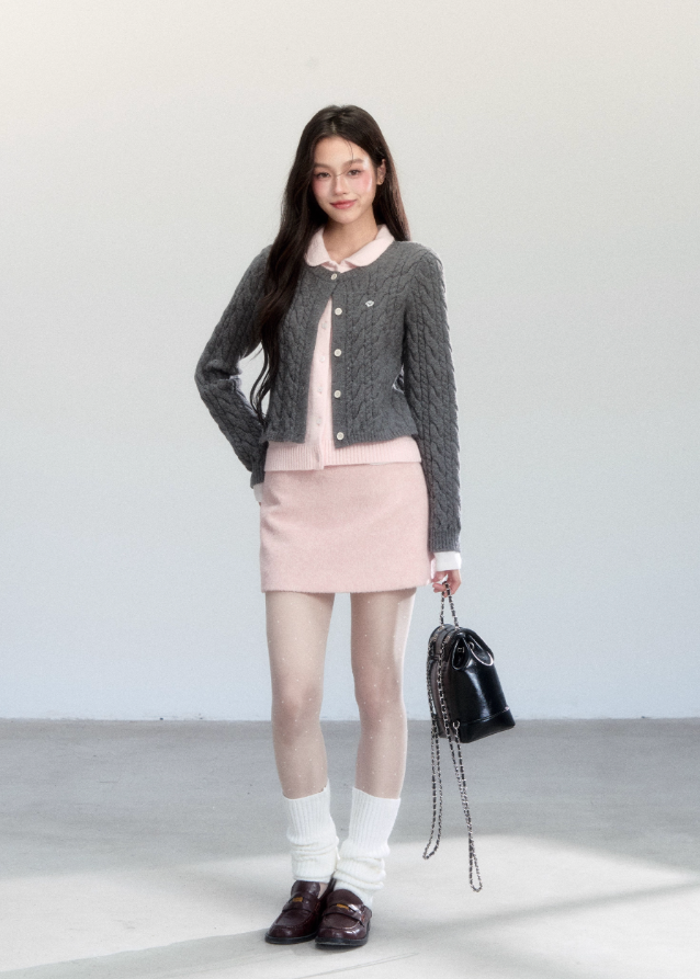 Fragileheart knit cardigan, faux two-piece sweater, doll collar knit top, luxury Korean fashion, quiet luxury womenswear, pastel noir aesthetic, elegant preppy outfit, 2025 winter K-fashion, contrast knit sweater, modern feminine knitwear, chic two-tone cardigan, sophisticated Korean look, soft autumn outfit, refined luxury fashion
