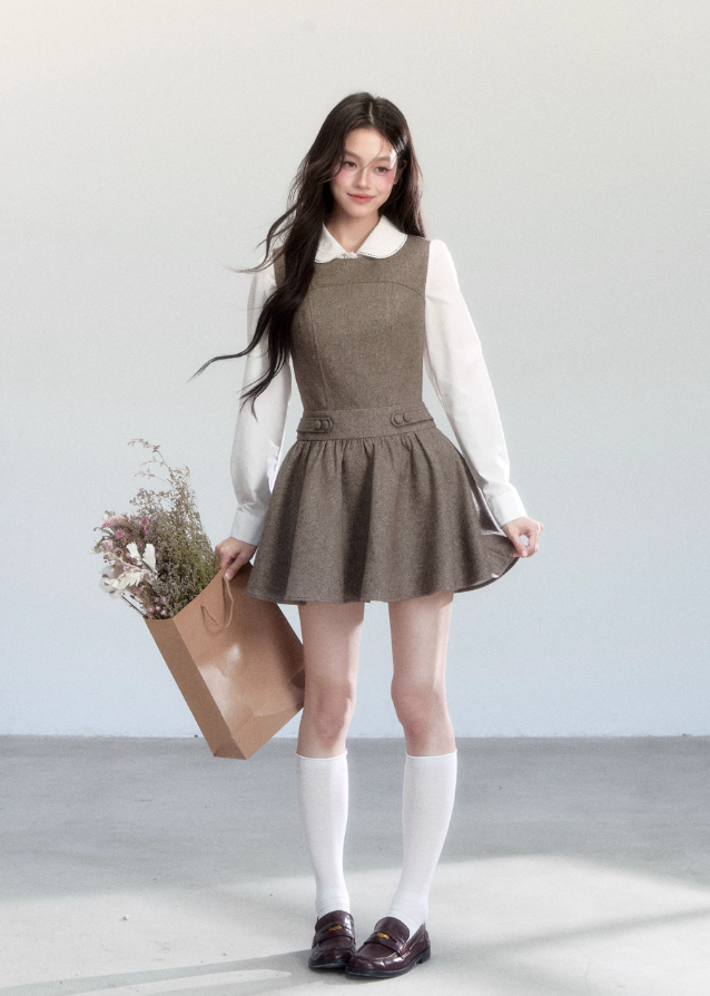 Fragileheart vest dress set, doll collar blouse, luxury Korean fashion, elegant autumn outfit, quiet luxury womenswear, pastel noir aesthetic, preppy Korean fashion, taupe layered dress, K-fashion 2025, modern feminine look, romantic school style, soft brown dress outfit, delicate preppy outfit, refined fall fashion
