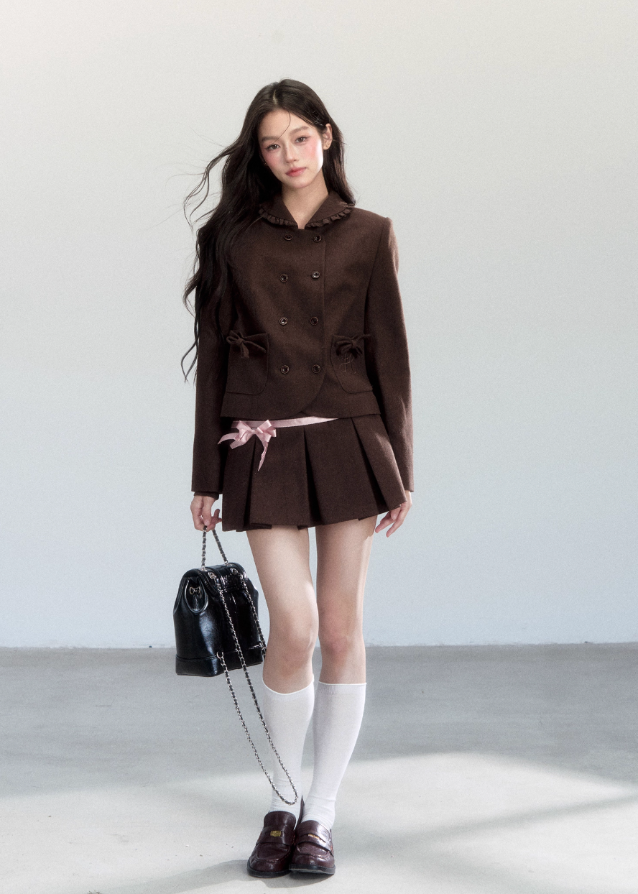 Fragileheart skirt suit set, brown pleated two-piece, luxury Korean fashion, doll collar jacket, vintage feminine outfit, quiet luxury womenswear, pastel noir aesthetic, elegant autumn ensemble, K-fashion 2025, romantic preppy look, mocha brown outfit, chic bow jacket set, soft classic fashion, refined Korean style
