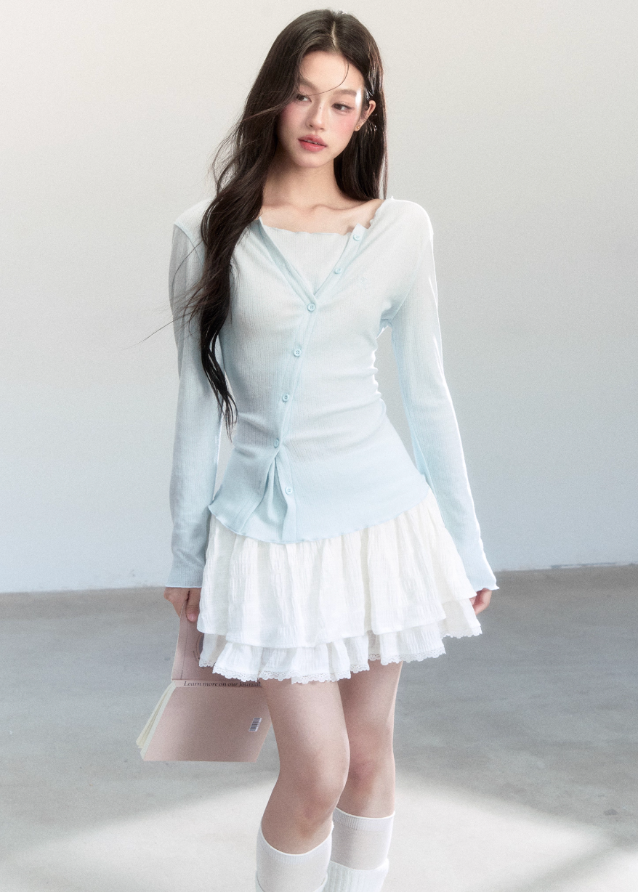 Fragileheart knit top, faux two-piece shirt, layered asymmetric blouse, luxury Korean fashion, minimal feminine outfit, quiet luxury womenswear, pastel noir aesthetic, elegant everyday top, four color knitwear, K-fashion 2025, casual chic long sleeve, modern Korean style, delicate soft knit, refined daily outfit
