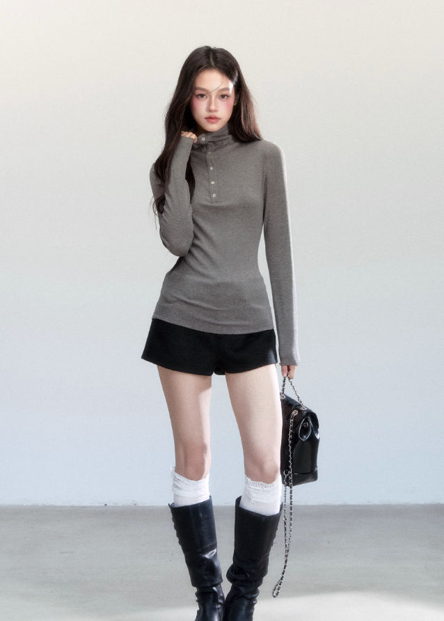 Fragileheart turtleneck top, slim long sleeve shirt, minimalist Korean fashion, quiet luxury womenswear, high neck base top, pastel noir aesthetic, elegant winter outfit, ivory and grey knitwear, modern feminine style, K-fashion 2025, chic commuter outfit, soft ribbed turtleneck, refined Korean fashion, luxury basic top
