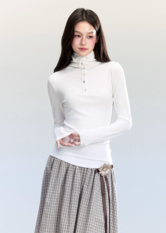 Fragileheart turtleneck top, slim long sleeve shirt, minimalist Korean fashion, quiet luxury womenswear, high neck base top, pastel noir aesthetic, elegant winter outfit, ivory and grey knitwear, modern feminine style, K-fashion 2025, chic commuter outfit, soft ribbed turtleneck, refined Korean fashion, luxury basic top
