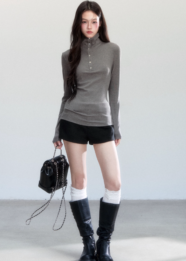 Fragileheart turtleneck top, slim long sleeve shirt, minimalist Korean fashion, quiet luxury womenswear, high neck base top, pastel noir aesthetic, elegant winter outfit, ivory and grey knitwear, modern feminine style, K-fashion 2025, chic commuter outfit, soft ribbed turtleneck, refined Korean fashion, luxury basic top
