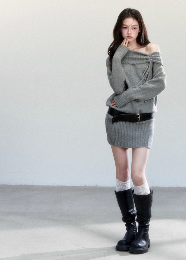 Fragileheart knit dress, off-shoulder wool dress, luxury Korean fashion, quiet luxury womenswear, grey sweater dress, pastel noir aesthetic, autumn knit outfit, elegant minimalist style, K-fashion 2025, refined feminine silhouette, soft draped neckline dress, cozy chic outfit, modern Korean fashion, sophisticated knitwear dress
