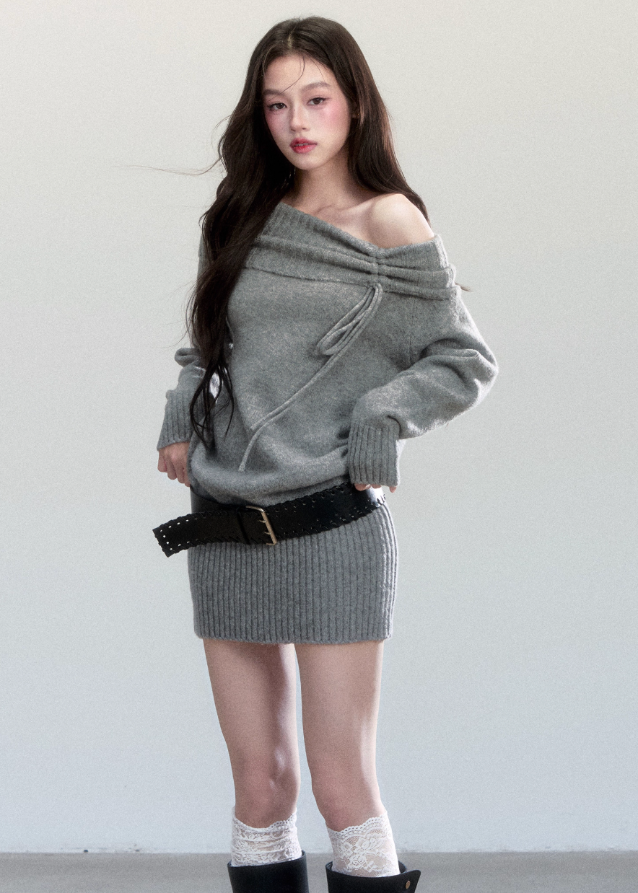 Fragileheart knit dress, off-shoulder wool dress, luxury Korean fashion, quiet luxury womenswear, grey sweater dress, pastel noir aesthetic, autumn knit outfit, elegant minimalist style, K-fashion 2025, refined feminine silhouette, soft draped neckline dress, cozy chic outfit, modern Korean fashion, sophisticated knitwear dress
