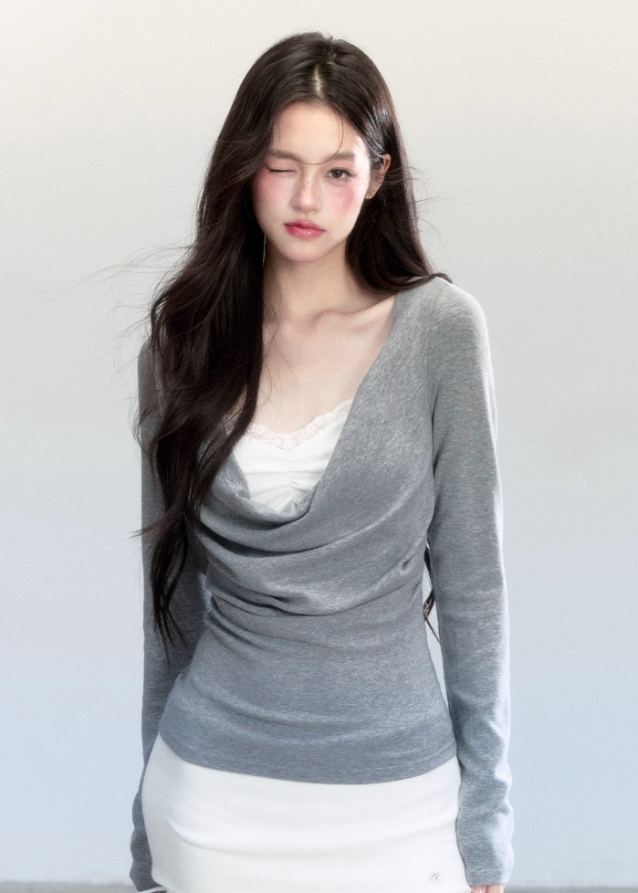 Fragileheart knit top, draped swing blouse, luxury Korean fashion, lace layered knitwear, quiet luxury womenswear, pastel noir aesthetic, grey slim-fit top, elegant autumn outfit, K-fashion 2025, minimalist feminine fashion, modern Korean style, soft two-piece knit, delicate off-shoulder top, refined knit blouse
