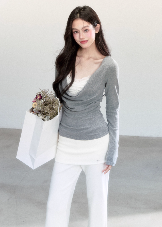 Fragileheart knit top, draped swing blouse, luxury Korean fashion, lace layered knitwear, quiet luxury womenswear, pastel noir aesthetic, grey slim-fit top, elegant autumn outfit, K-fashion 2025, minimalist feminine fashion, modern Korean style, soft two-piece knit, delicate off-shoulder top, refined knit blouse
