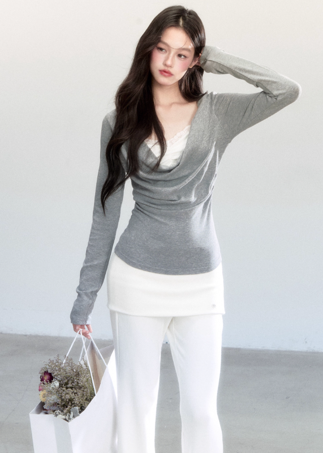 Fragileheart knit top, draped swing blouse, luxury Korean fashion, lace layered knitwear, quiet luxury womenswear, pastel noir aesthetic, grey slim-fit top, elegant autumn outfit, K-fashion 2025, minimalist feminine fashion, modern Korean style, soft two-piece knit, delicate off-shoulder top, refined knit blouse
