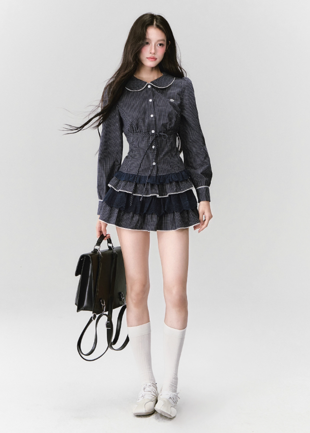 Fragileheart lace set, gingham blouse skirt, luxury Korean fashion, elegant two-piece outfit, soft preppy K-fashion, 2025 fall collection, quiet luxury style, pastel noir aesthetic, romantic layered skirt, modern feminine fashion, luxury womenswear, Korean academic outfit, chic lace two-piece dress, graceful preppy look, soft vintage fashion
