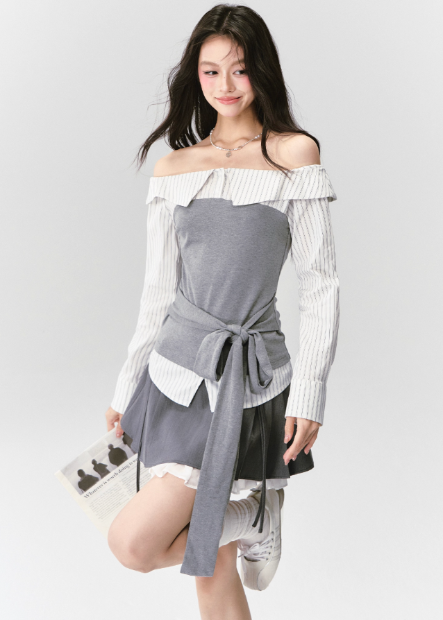Fragileheart off-shoulder blouse, grey patchwork top, asymmetric layered shirt, luxury Korean fashion, elegant autumn outfit, quiet luxury style, pastel noir aesthetic, K-fashion 2025, structured feminine top, intellectual modern look, pre-fall womenswear, romantic Korean blouse, soft grey knit shirt, delicate tailored outfit
