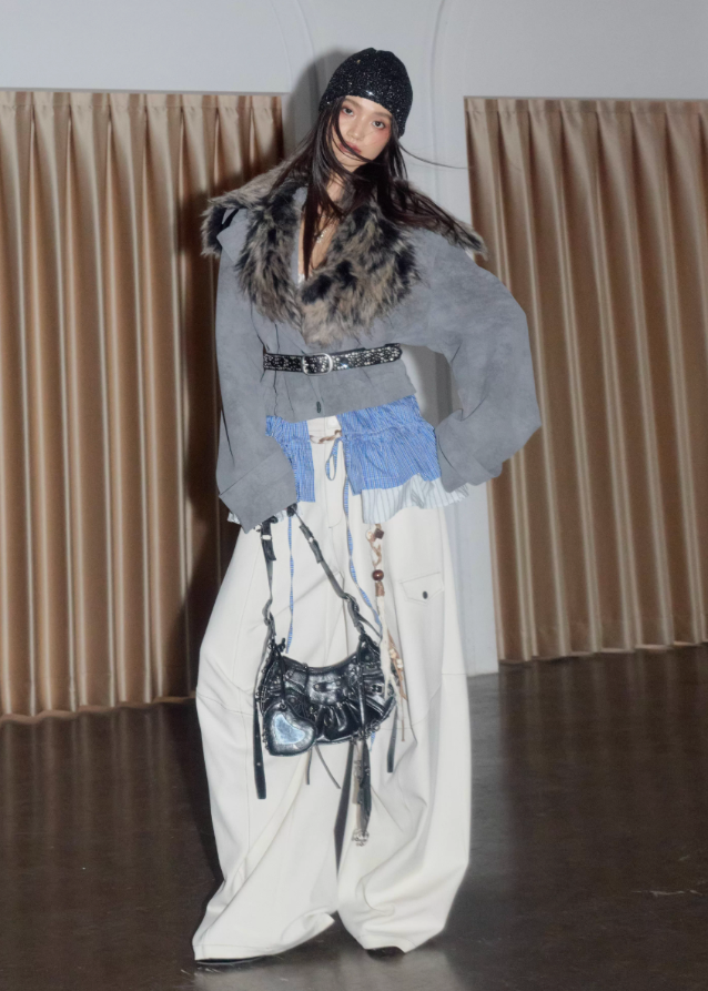 korean street jacket, faux fur collar jacket women, detachable hem jacket, hybrid layered jacket, matte grey PU leather coat, nomadic street style jacket, JNYLON outerwear, fake two piece jacket women, urban grunge fashion, deconstructed winter jacket, asymmetrical hem coat, korean edgy fashion, layered PU leather jacket, faux fur grey jacket women
