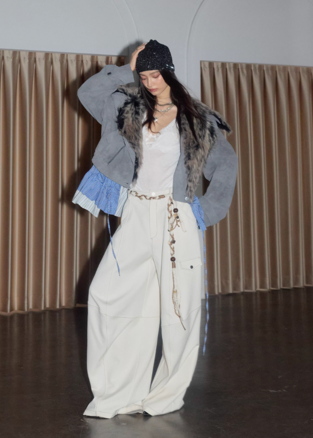 korean street jacket, faux fur collar jacket women, detachable hem jacket, hybrid layered jacket, matte grey PU leather coat, nomadic street style jacket, JNYLON outerwear, fake two piece jacket women, urban grunge fashion, deconstructed winter jacket, asymmetrical hem coat, korean edgy fashion, layered PU leather jacket, faux fur grey jacket women
