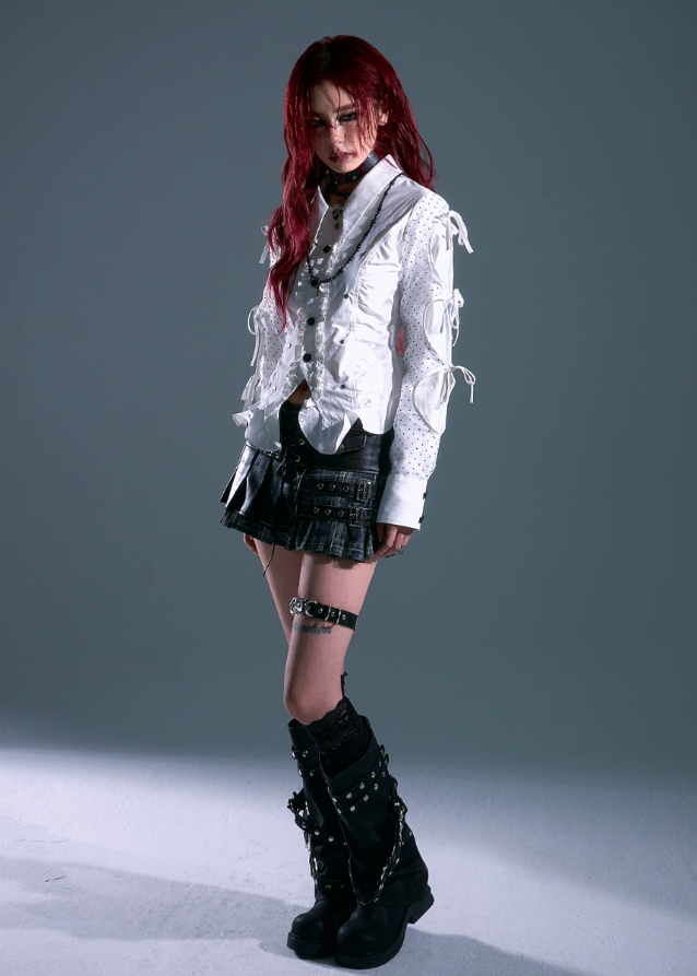 edgy leather mini skirt, punk low waist skirt, grunge strap skirt women, leather stitched pleated skirt, frustration garden skirt, gothic plaid mini skirt, metal hardware mini skirt, punk a-line short skirt, street goth fashion skirt, low rise grunge skirt, punk vintage leather skirt
