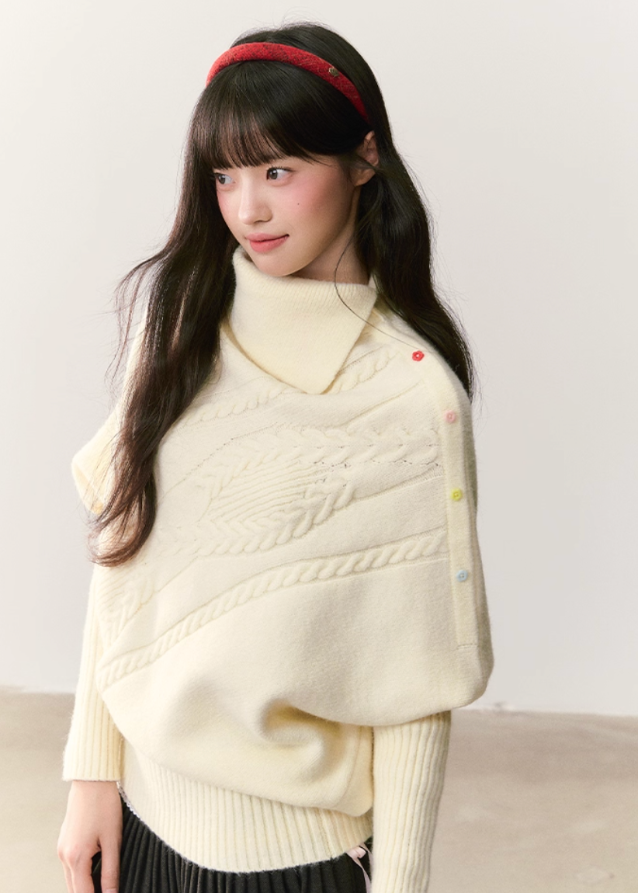 umoumo knit top, Korean style sweater, feminine knitwear, asymmetrical lapel sweater, cape style sweater, cable knit pullover, off-white cable sweater, colorful button sweater, winter Korean fashion, soft girl aesthetic knit, oversized feminine sweater, cozy winter top, girly Korean knitwear, cute cape sweater, asym knit design
