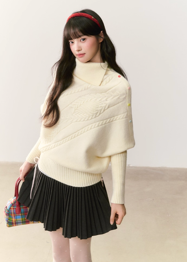 umoumo knit top, Korean style sweater, feminine knitwear, asymmetrical lapel sweater, cape style sweater, cable knit pullover, off-white cable sweater, colorful button sweater, winter Korean fashion, soft girl aesthetic knit, oversized feminine sweater, cozy winter top, girly Korean knitwear, cute cape sweater, asym knit design
