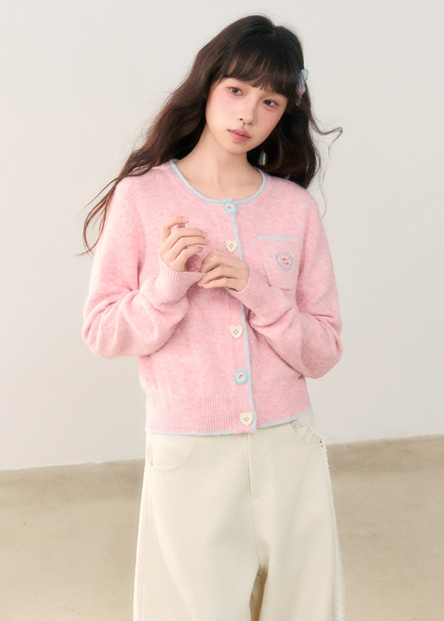 pastel cardigan, heart embroidery knit, contrast trim sweater, Korean girly fashion, AW soft knitwear, umoumo aesthetic cardigan, sweet colored yarn knit, pastel blue cardigan, cute heart badge knit, feminine Korean outfit, loose cozy knit jacket, pink button cardigan, soft winter knit, Fragileheart aesthetic, girly pastel style, cute short cardigan, warm autumn winter knit top, Korean cute girl sweater