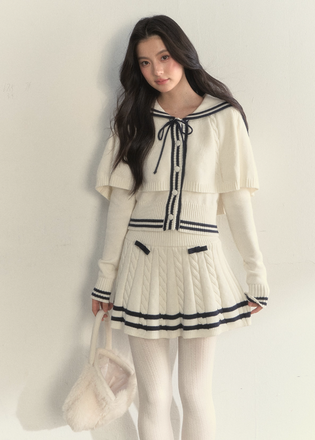 SunsetPark knit set, navy collar knit cape, vintage sailor outfit, twist knit sweater set, winter pleated skirt set, feminine old-fashioned style, cozy Korean winter knit, cream sailor knit top, navy trim pleated skirt, romantic winter outfit, girly vintage knitwear, classic sailor collar set, AW Korean fashion set