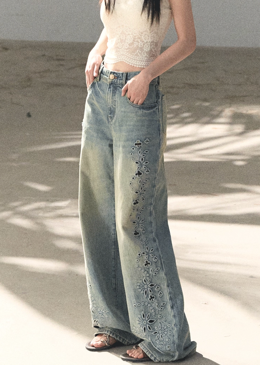 OAKMOO jeans, Korean embroidered denim, laser cut jeans women, floral perforated denim, vintage wash jeans women, loose fit jeans Korean style, spring denim women, luxury embroidered jeans, wide leg denim women, OAKMOO spring collection, feminine denim pants, old style jeans women