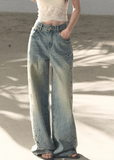 OAKMOO jeans, Korean embroidered denim, laser cut jeans women, floral perforated denim, vintage wash jeans women, loose fit jeans Korean style, spring denim women, luxury embroidered jeans, wide leg denim women, OAKMOO spring collection, feminine denim pants, old style jeans women