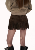 suede fringe shorts women, western style shorts women, y2k mini shorts, high fashion suede shorts, brown fringe shorts, street style shorts women, autumn winter fashion shorts, statement mini slacks, trendy suede bottoms, mamc shorts style, unique design shorts, fringe detail shorts, y2k streetwear women, premium women shorts, fashion western shorts