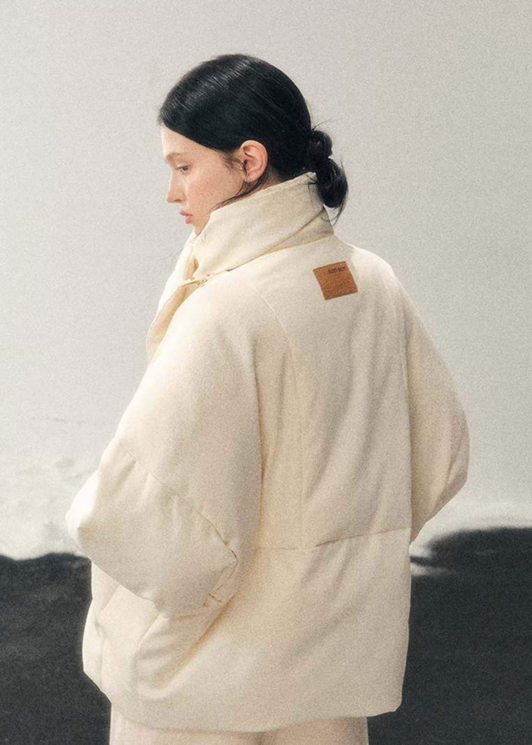 white duck down jacket women, winter down coat women, turtleneck puffer jacket, korean minimal outerwear, warm winter jacket women, premium down coat, thickened winter jacket, elegant puffer women, refined winter outerwear, aomalm down style, understated luxury coat, cold weather jacket women, modern women down jacket, soft silhouette winter coat, daily winter essential