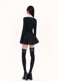 lace drape knit top women, slim fit black knit top, fake two waist top, edgy base layer women, dark minimalist fashion top, vock knit style, waist shaping long sleeve top, alternative fashion knitwear, structured women top, modern black lace top, cold style womenswear, body contour knit top, urban edgy clothing women, minimalist street fashion top, controlled silhouette knit