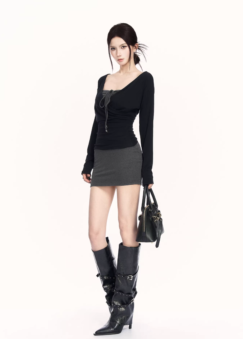 black gray knit set women, two piece knit skirt set, edgy slim fit outfit, v neck knit top women, bodycon skirt set women, dark minimalist fashion, vock set style, urban women knitwear, waist shaping knit set, alternative street fashion women, modern black outfit women, controlled silhouette clothing, edgy spring knit set, slim fit knitwear women, minimalist street set