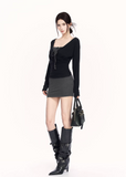 black gray knit set women, two piece knit skirt set, edgy slim fit outfit, v neck knit top women, bodycon skirt set women, dark minimalist fashion, vock set style, urban women knitwear, waist shaping knit set, alternative street fashion women, modern black outfit women, controlled silhouette clothing, edgy spring knit set, slim fit knitwear women, minimalist street set