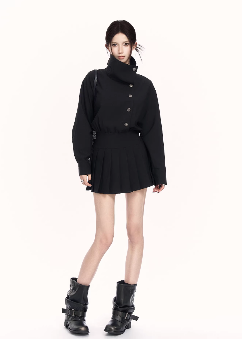 trench style mini dress women, pleated waist dress, british college dress women, edgy commuter dress, lapel mini dress women, dark minimalist fashion dress, vock dress style, tailored spring dress women, urban preppy dress, waist shaping mini dress, alternative office wear women, structured pleated dress, modern black gray dress, controlled silhouette fashion, early spring women dress