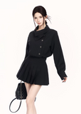 trench style mini dress women, pleated waist dress, british college dress women, edgy commuter dress, lapel mini dress women, dark minimalist fashion dress, vock dress style, tailored spring dress women, urban preppy dress, waist shaping mini dress, alternative office wear women, structured pleated dress, modern black gray dress, controlled silhouette fashion, early spring women dress