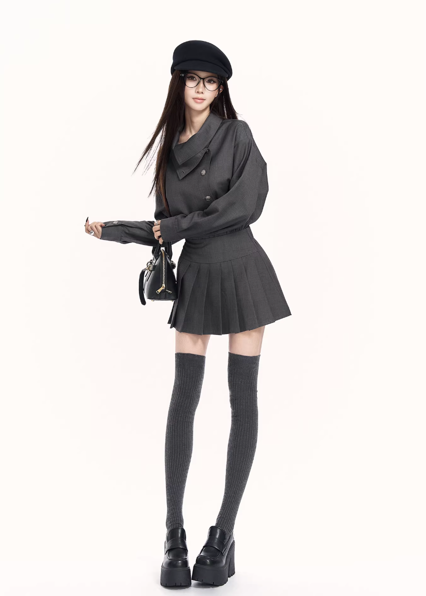 trench style mini dress women, pleated waist dress, british college dress women, edgy commuter dress, lapel mini dress women, dark minimalist fashion dress, vock dress style, tailored spring dress women, urban preppy dress, waist shaping mini dress, alternative office wear women, structured pleated dress, modern black gray dress, controlled silhouette fashion, early spring women dress