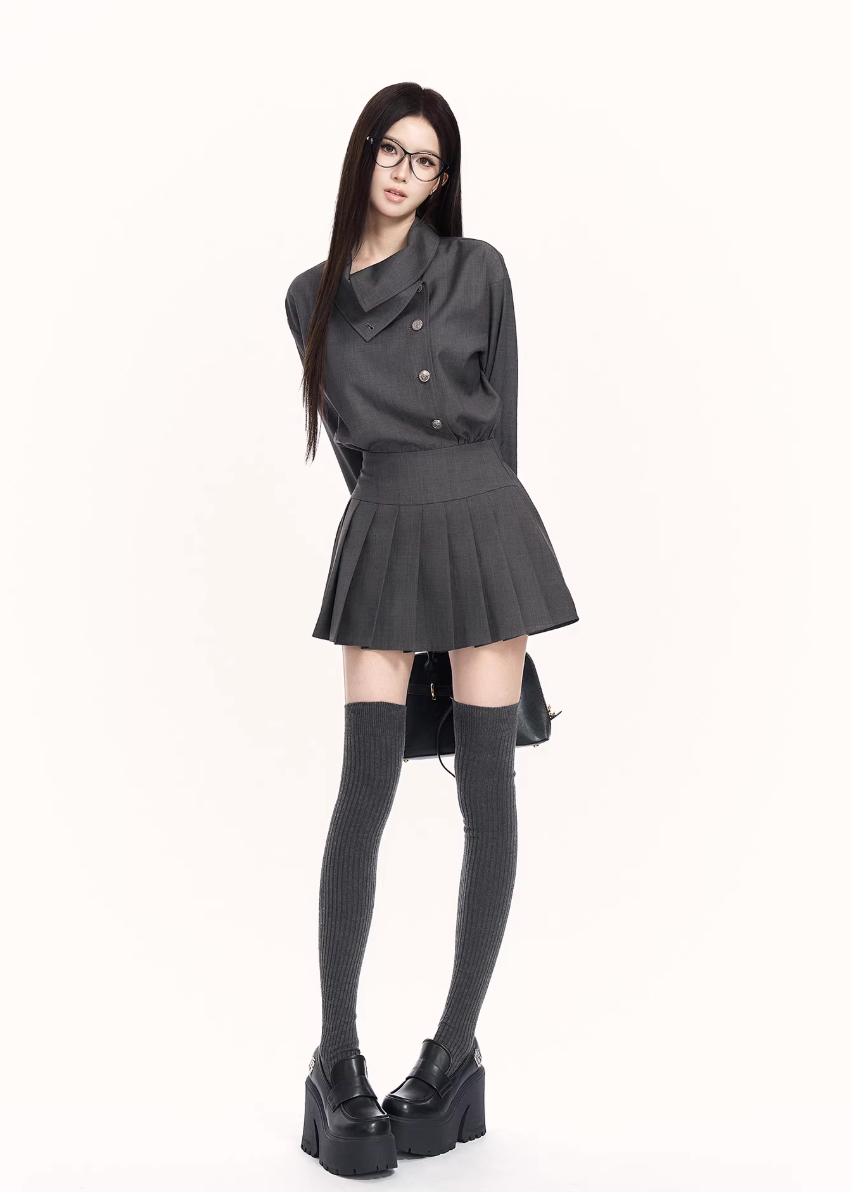 trench style mini dress women, pleated waist dress, british college dress women, edgy commuter dress, lapel mini dress women, dark minimalist fashion dress, vock dress style, tailored spring dress women, urban preppy dress, waist shaping mini dress, alternative office wear women, structured pleated dress, modern black gray dress, controlled silhouette fashion, early spring women dress
