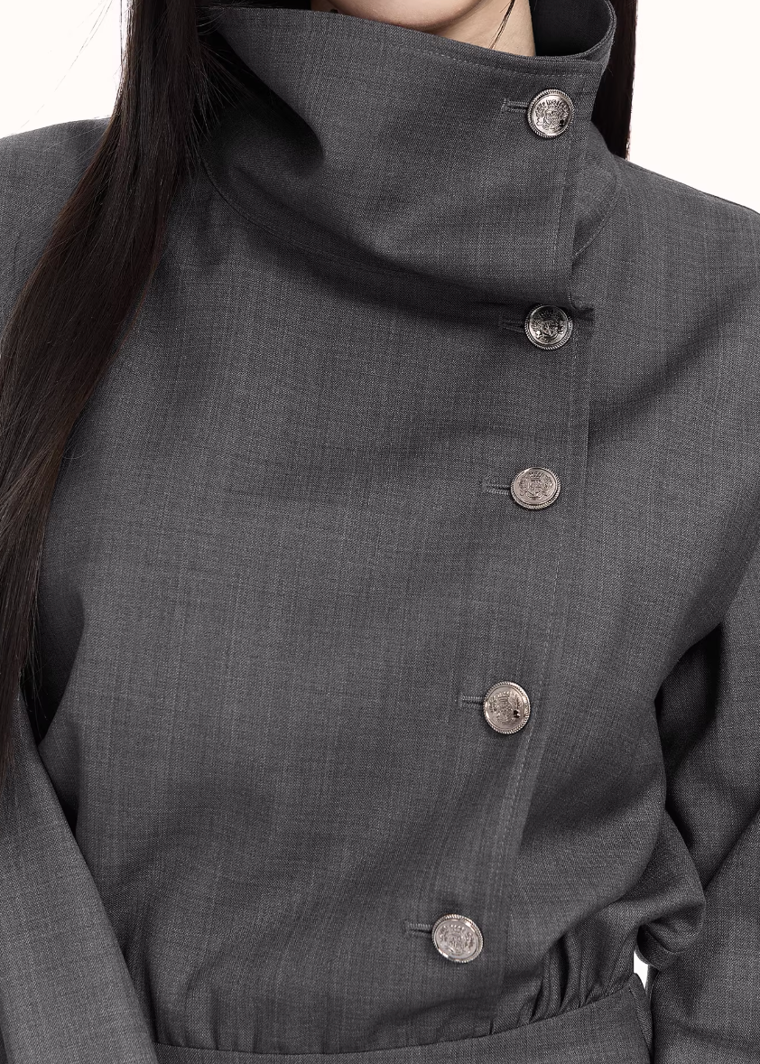 trench style mini dress women, pleated waist dress, british college dress women, edgy commuter dress, lapel mini dress women, dark minimalist fashion dress, vock dress style, tailored spring dress women, urban preppy dress, waist shaping mini dress, alternative office wear women, structured pleated dress, modern black gray dress, controlled silhouette fashion, early spring women dress