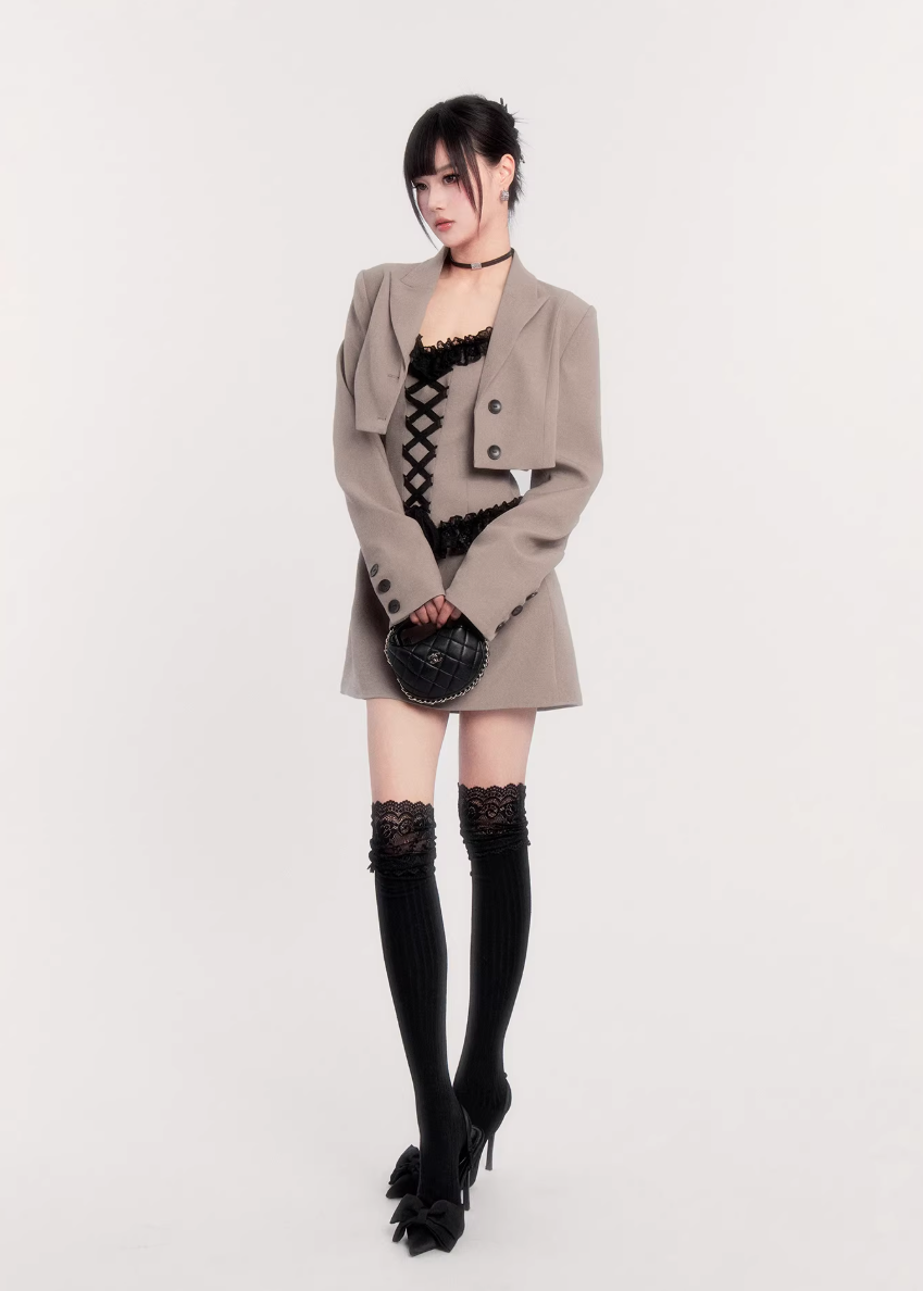 two piece blazer dress women, lace panel mini dress, cropped blazer set women, edgy tailored outfit, vock two piece set, waist defining mini dress, dark minimalist fashion women, structured blazer mini dress, alternative fashion set women, modern street tailoring, controlled silhouette clothing, edgy spring outfit women, contrast texture dress set, statement women suit set, urban luxury womenswear