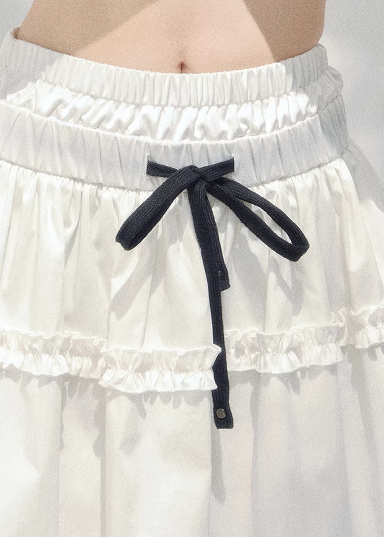 white spring skirt women, french lace skirt, cotton mini skirt women, aomalm skirt style, elegant spring outfit women, feminine white skirt, lightweight lace skirt, refined casual skirt women, korean french style clothing, elastic waist skirt women, spring fashion women skirt, delicate lace detail skirt, modern women skirt, soft a line skirt, everyday elegant skirt