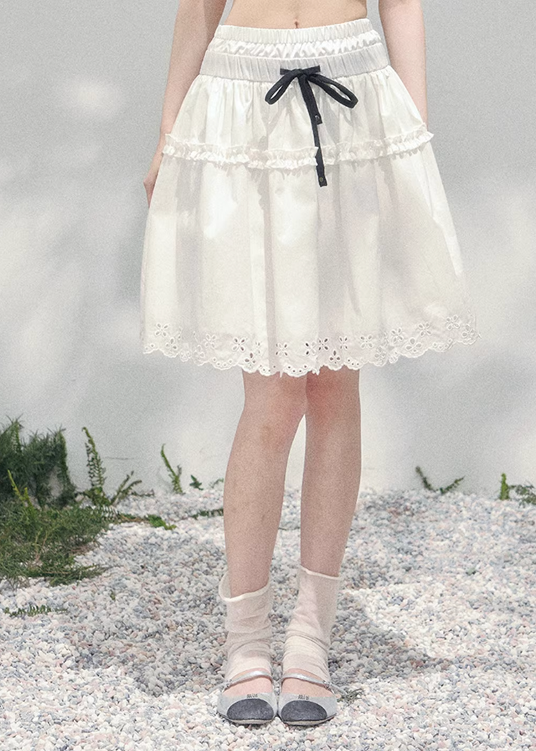 white spring skirt women, french lace skirt, cotton mini skirt women, aomalm skirt style, elegant spring outfit women, feminine white skirt, lightweight lace skirt, refined casual skirt women, korean french style clothing, elastic waist skirt women, spring fashion women skirt, delicate lace detail skirt, modern women skirt, soft a line skirt, everyday elegant skirt