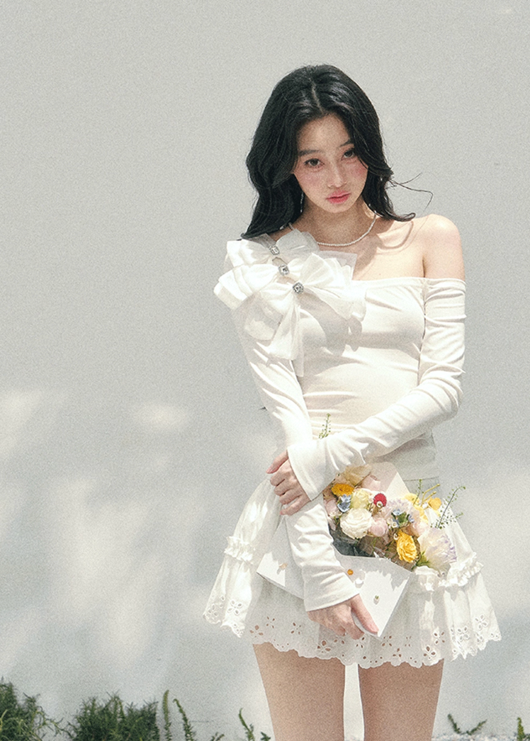 off shoulder long sleeve top women, bow detail spring top, slim fit t shirt women, aomalm top style, feminine spring outfit women, elegant off shoulder tee, refined casual women top, korean french style clothing, lightweight spring top women, shoulder revealing top women, modern women long sleeve tee, delicate bow top, understated luxury spring wear, hot girl spring top, versatile women fashion top