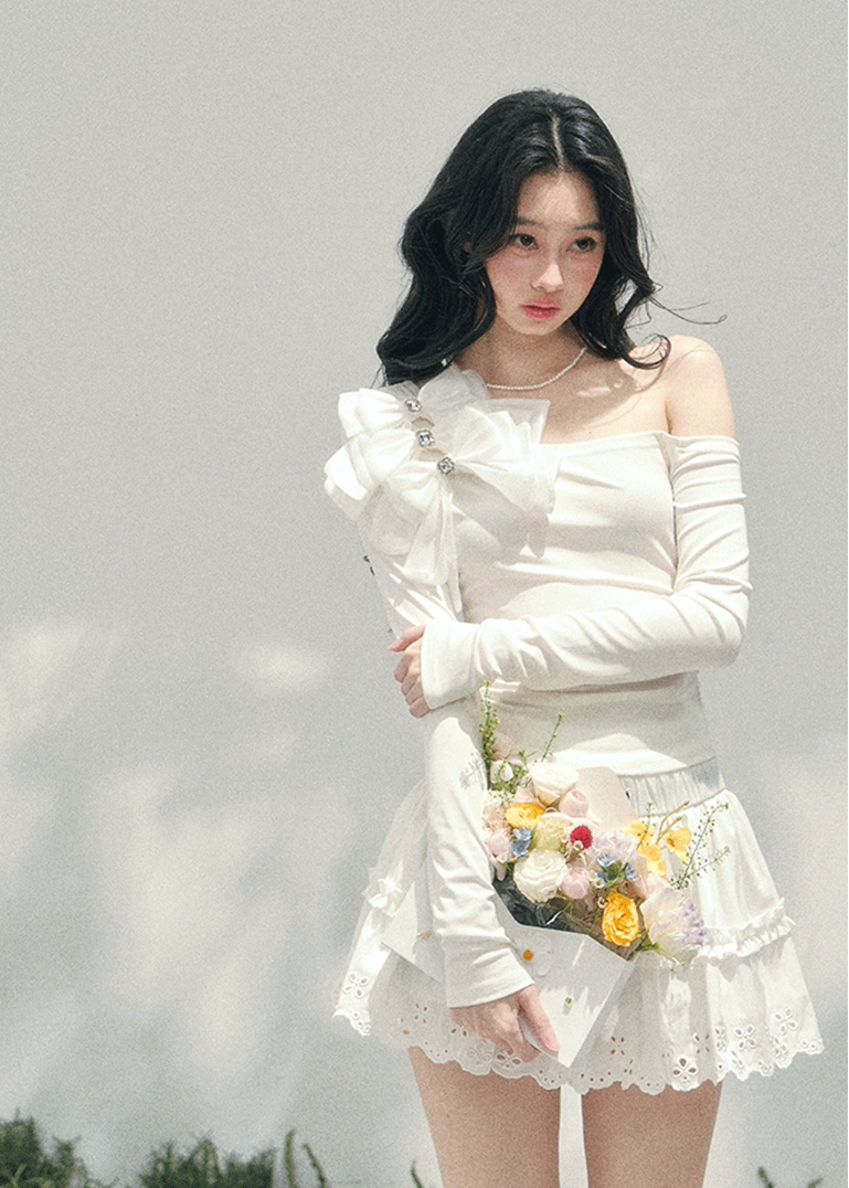 off shoulder long sleeve top women, bow detail spring top, slim fit t shirt women, aomalm top style, feminine spring outfit women, elegant off shoulder tee, refined casual women top, korean french style clothing, lightweight spring top women, shoulder revealing top women, modern women long sleeve tee, delicate bow top, understated luxury spring wear, hot girl spring top, versatile women fashion top