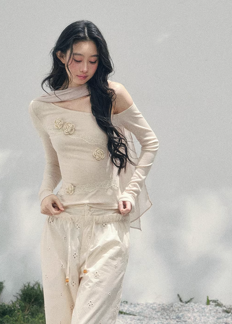 AOMALM lace top, off shoulder floral top, French romantic blouse, Korean feminine fashion, spring cropped lace top, asymmetric shoulder knit, rose appliqué top, quiet luxury womenswear, elegant fitted spring top, sheer texture fashion, waist defining blouse, Parisian inspired fashion top, soft romantic silhouette, three dimensional flower lace shirt, luxury Korean designer style, refined spring layering piece, feminine minimalist top, delicate floral blouse women, romantic cropped knit top, French Korean ae