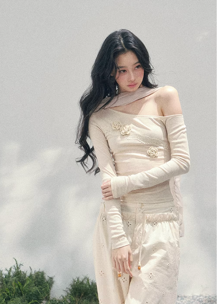 AOMALM lace top, off shoulder floral top, French romantic blouse, Korean feminine fashion, spring cropped lace top, asymmetric shoulder knit, rose appliqué top, quiet luxury womenswear, elegant fitted spring top, sheer texture fashion, waist defining blouse, Parisian inspired fashion top, soft romantic silhouette, three dimensional flower lace shirt, luxury Korean designer style, refined spring layering piece, feminine minimalist top, delicate floral blouse women, romantic cropped knit top, French Korean ae