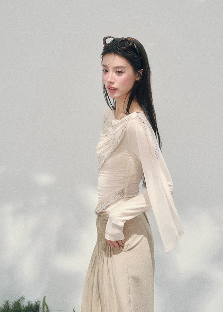 AOMALM sheer glitter knit top women, French romantic draped blouse, feminine translucent spring knitwear, Korean elegant slim fit top, quiet luxury romantic outfit, Parisian inspired shimmer knit top, delicate crystal detail blouse, romantic Korean French aesthetic clothing, lightweight spring sheer top women, refined luxury womenswear knit, soft feminine waist slimming blouse, elegant sparkling knit top women, luxury Korean designer inspired clothing