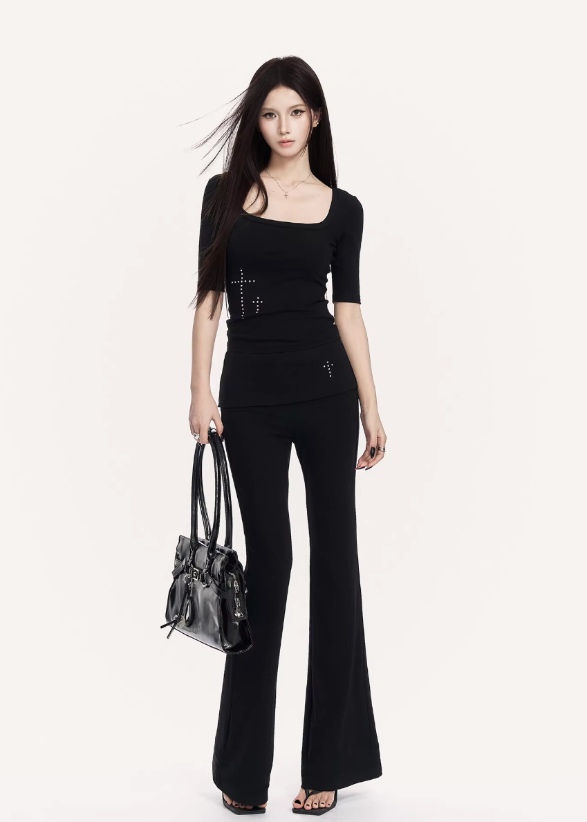 VOCK flared trousers set women, urban studded knit top, minimalist low rise flare pants, Korean street luxury outfit, cold urban aesthetic womenswear, sleek monochrome streetwear set, modern Seoul street style trousers, structured slim fit knit top, VOCK power dressing outfit, architectural silhouette streetwear, edgy minimalist flare pants women, urban fitted T-shirt set, clean line street fashion ensemble