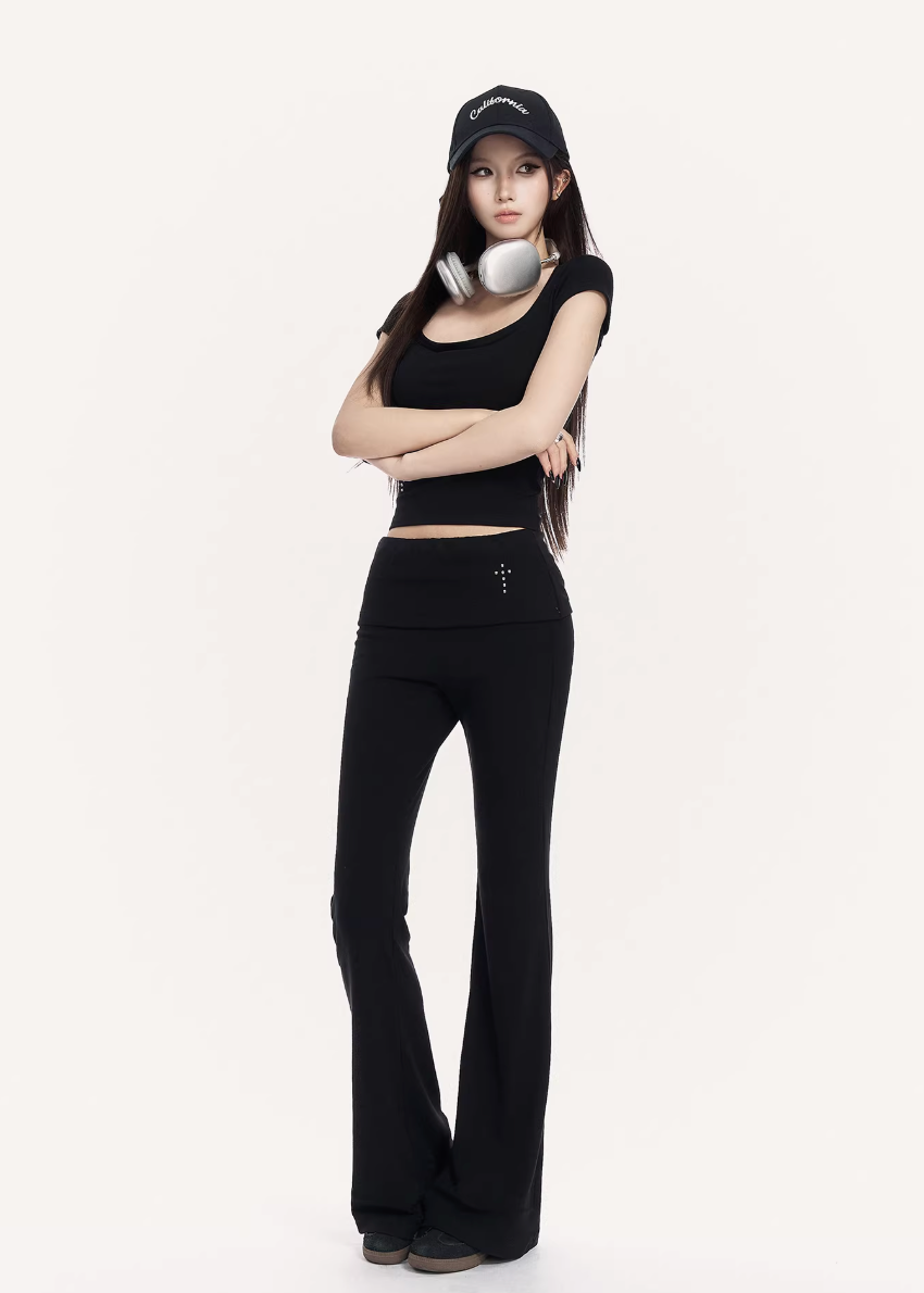 VOCK flared trousers set women, urban studded knit top, minimalist low rise flare pants, Korean street luxury outfit, cold urban aesthetic womenswear, sleek monochrome streetwear set, modern Seoul street style trousers, structured slim fit knit top, VOCK power dressing outfit, architectural silhouette streetwear, edgy minimalist flare pants women, urban fitted T-shirt set, clean line street fashion ensemble