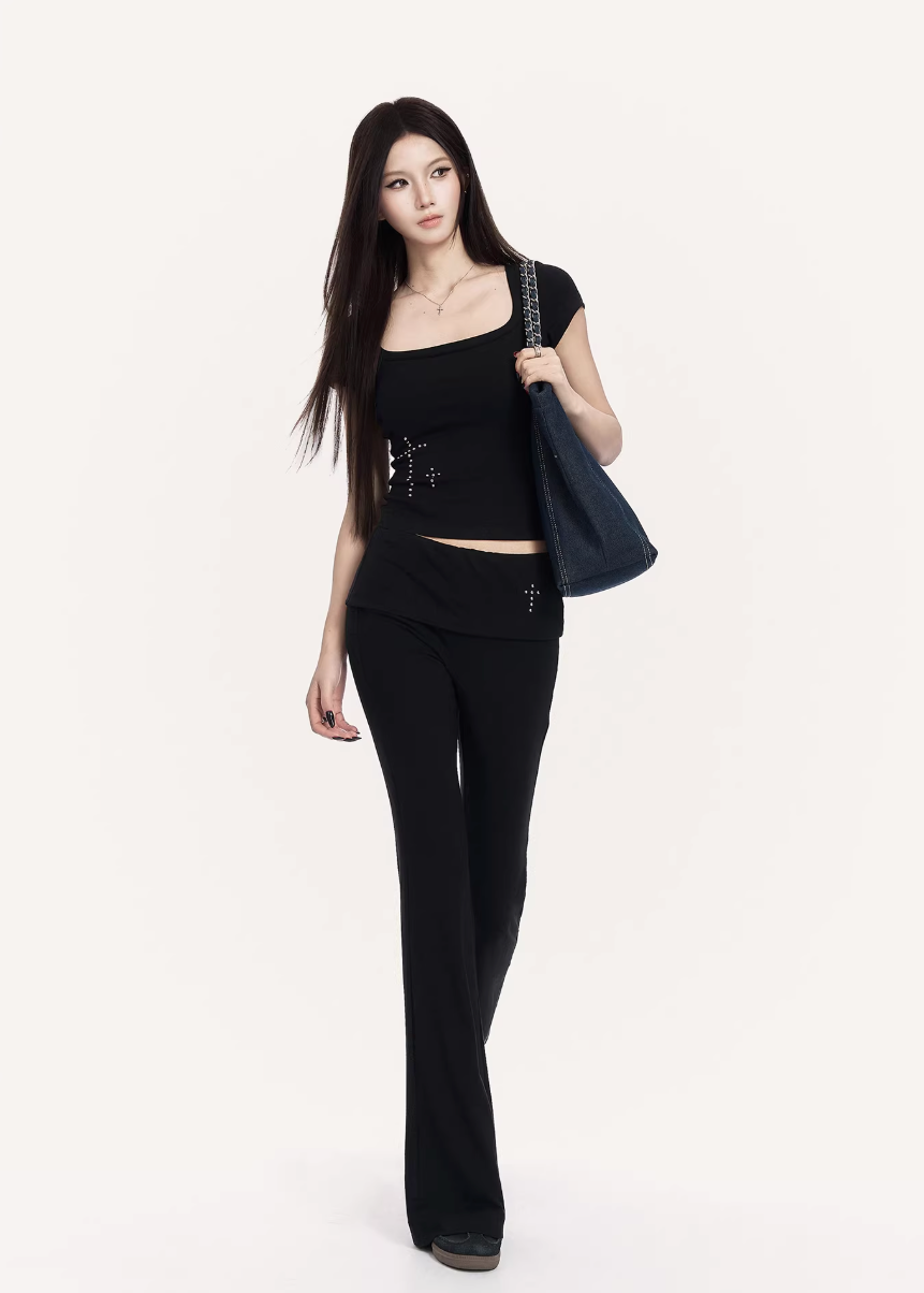 VOCK flared trousers set women, urban studded knit top, minimalist low rise flare pants, Korean street luxury outfit, cold urban aesthetic womenswear, sleek monochrome streetwear set, modern Seoul street style trousers, structured slim fit knit top, VOCK power dressing outfit, architectural silhouette streetwear, edgy minimalist flare pants women, urban fitted T-shirt set, clean line street fashion ensemble