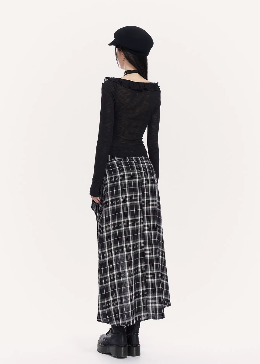 VOCK plaid maxi skirt women, urban asymmetric long skirt, minimalist black white check skirt, Korean street luxury maxi skirt, cold urban aesthetic womenswear, architectural curved hem skirt, modern Seoul street style plaid skirt, integrated shorts long skirt women, VOCK structured silhouette skirt, edgy monochrome streetwear skirt, power dressing plaid maxi outfit